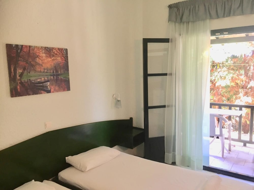 Фото Nikos Apartments