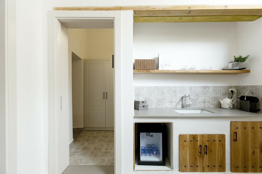 Фото Akotika boutique Old City Apartments