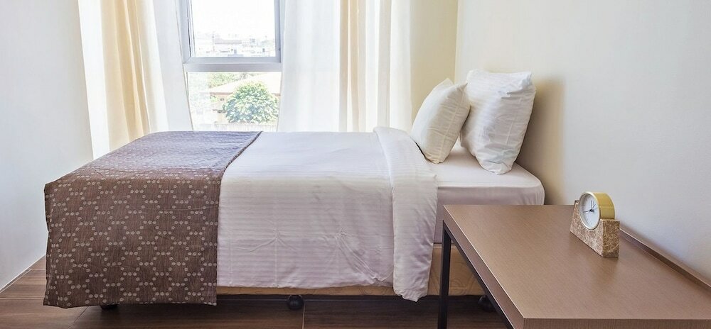 Фото Padgett Place - Deluxe Suites