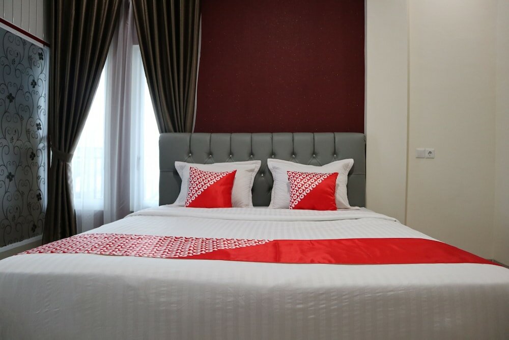Фото Oyo 1648 Penginapan Three Joye