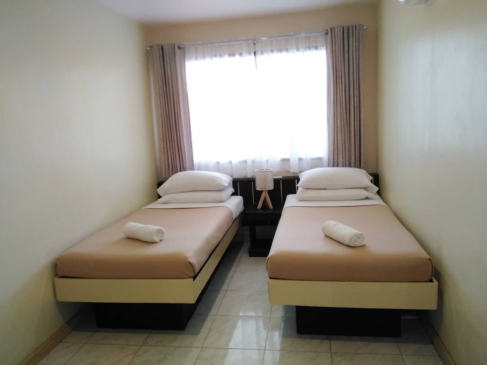 Фото The Royale House Travel Inn and Dormitel