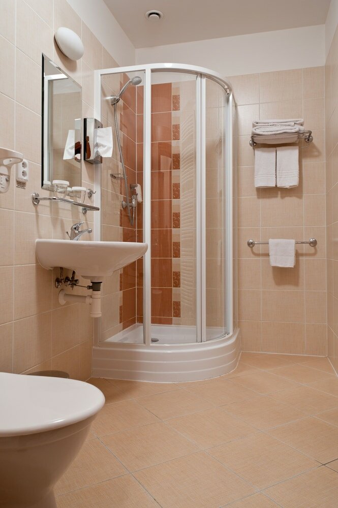 Фото Amigo City Centre Hotel