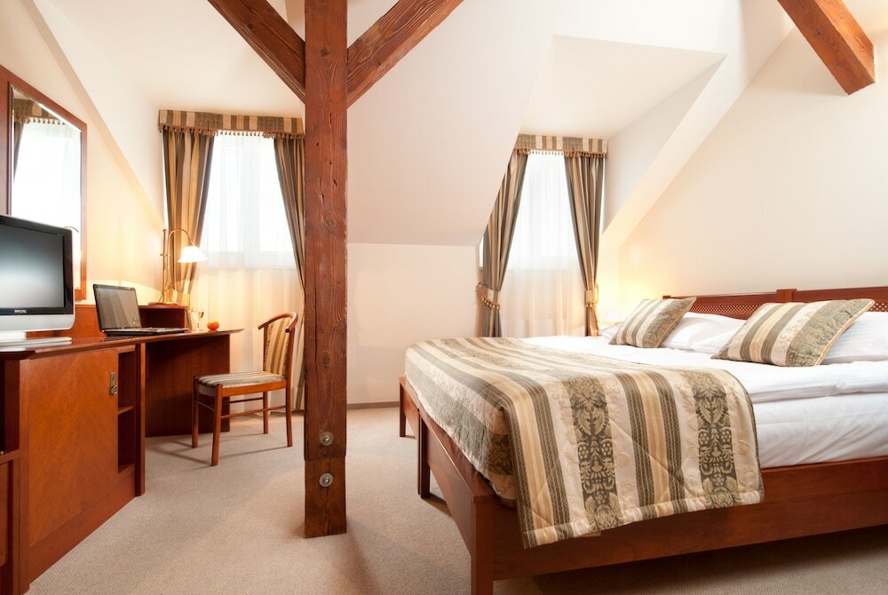 Фото Amigo City Centre Hotel