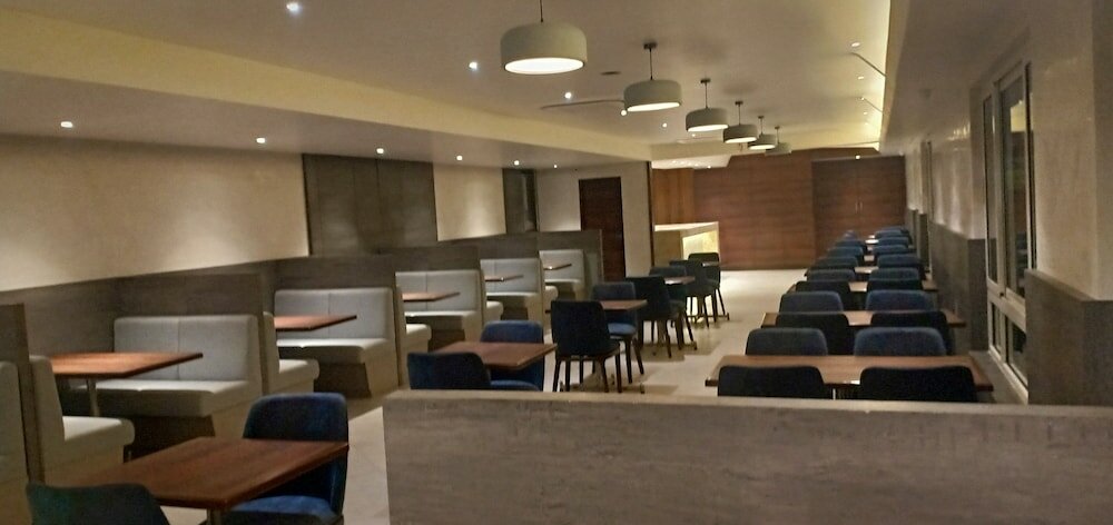 Фото Cosmique Clarks Inn Suites, Goa