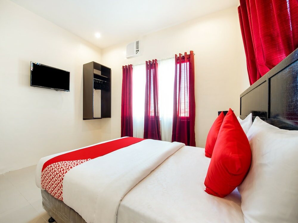 Фото Oyo 490 V-cat Apartelle