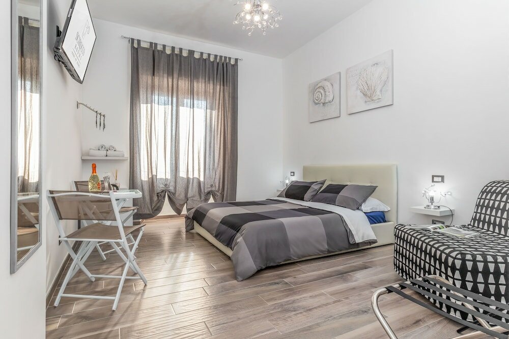 Фото Scirocco Rooms