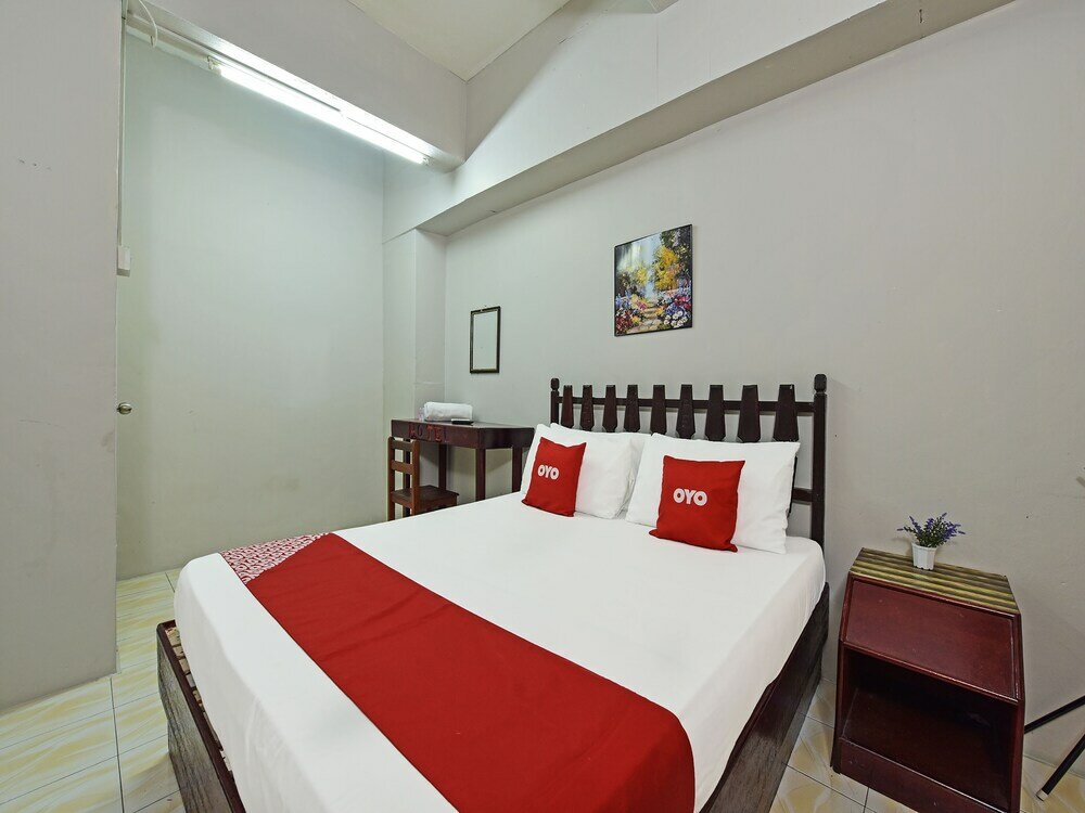 Фото Super Oyo Capital O 90659 Raintown Timbers Hotel