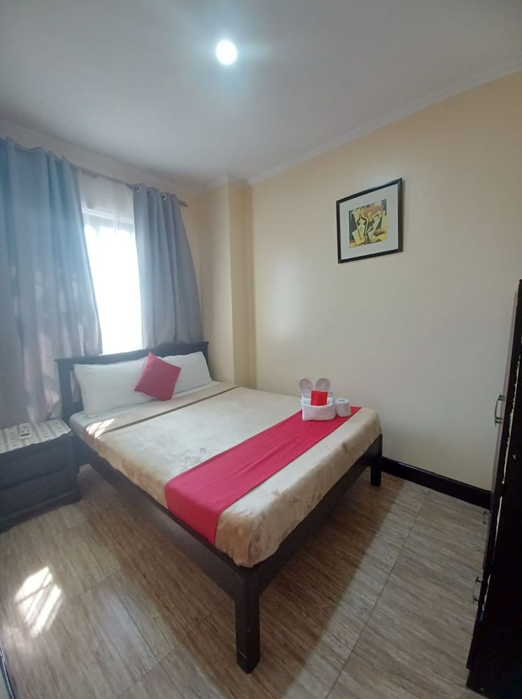 Фото Oyo 908 153 Silverio Suites