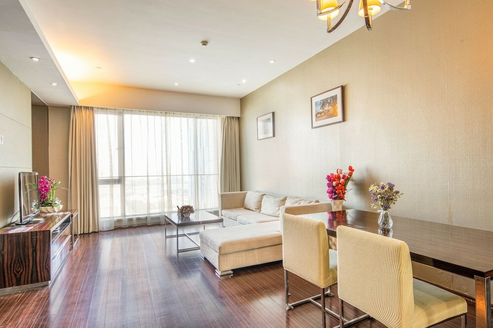 Фото Xingyi International Hotel Poly Store