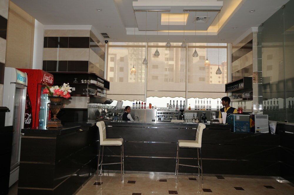 Фото Al Muhanna Plaza Hotel