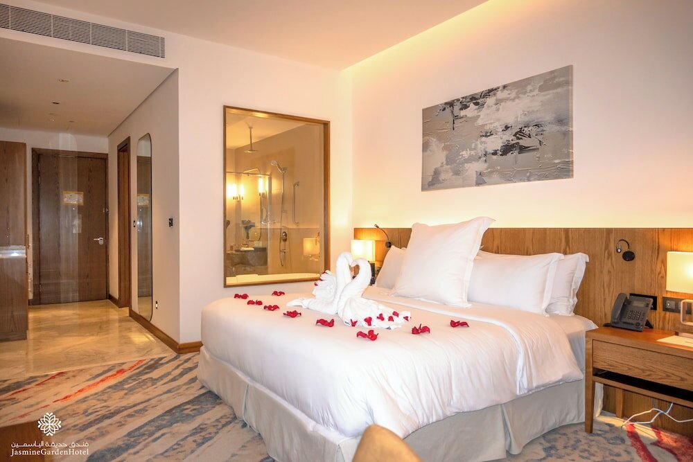 Фото Jasmine Garden Hotel