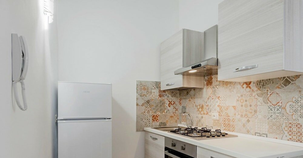 Фото Trinità 57 Apartments