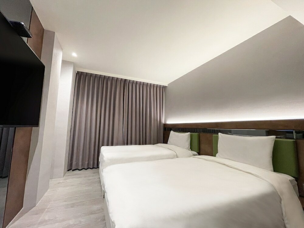 Фото Check inn Taichung Qinghai