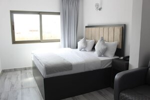 Гостиница Holiday Season Hotel