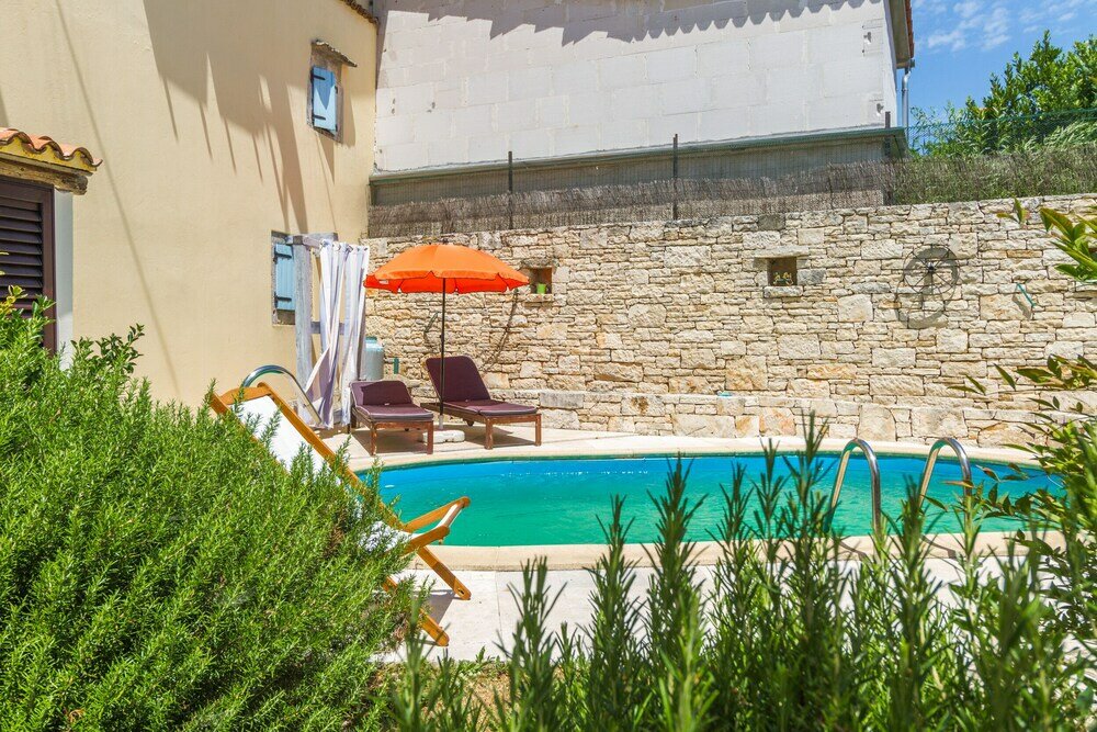 Фото Especially charm stone house with a pool