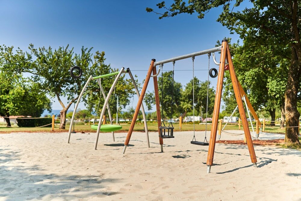 Фото Mediteran Mobile Homes Camping Park Umag