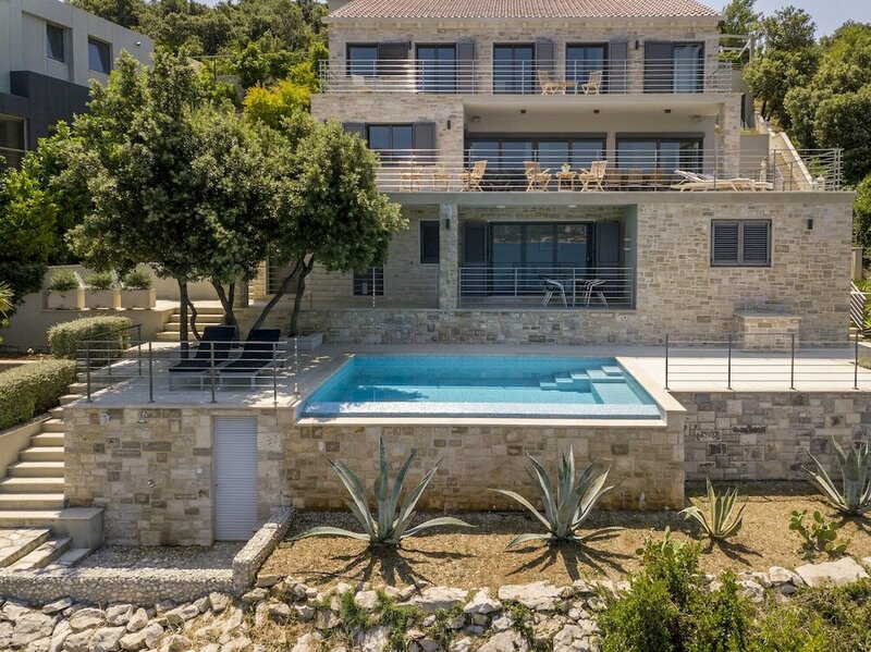Гостиница Beachfront Villa Poseidon with Heated Pool