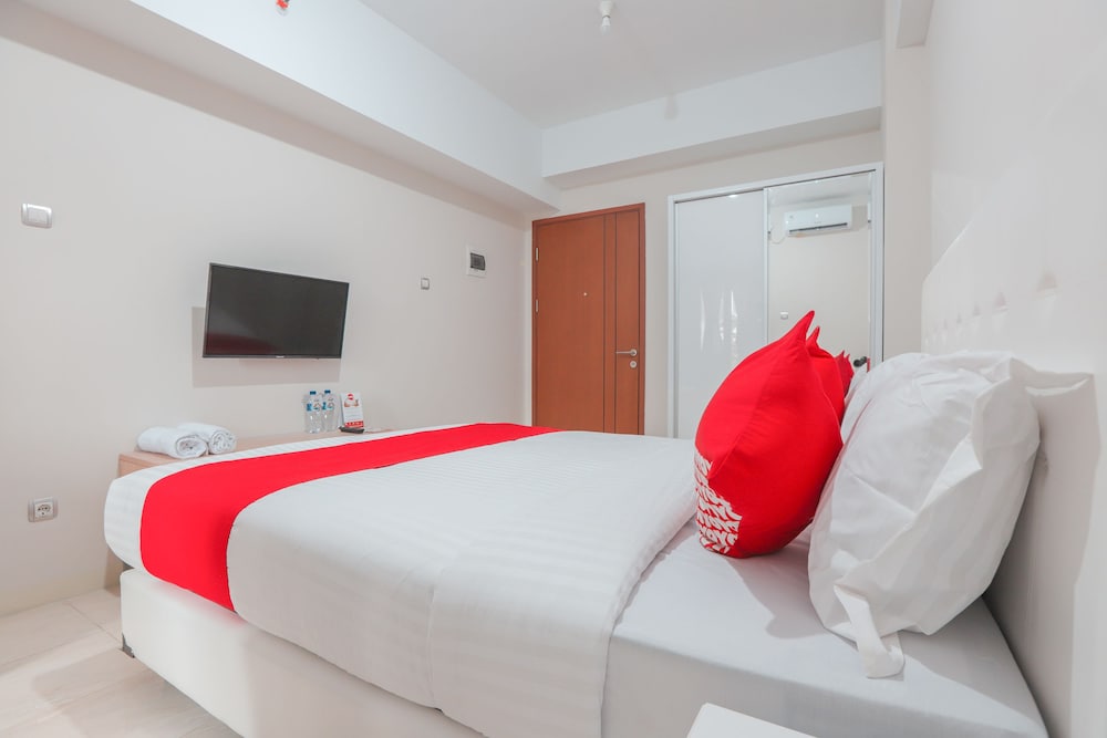 Фото Oyo 498 Green Lake View Ciputat Syariah