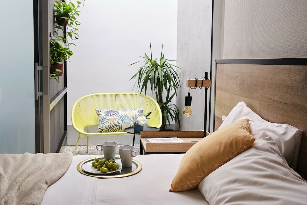 Фото Sweet Sevilla Suites