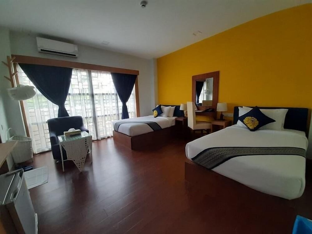 Фото Agga@9mile Hotel