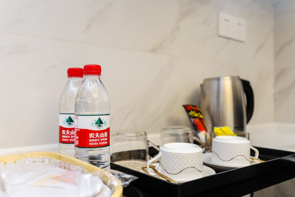 Фото Yue Qi Hotel Apartment