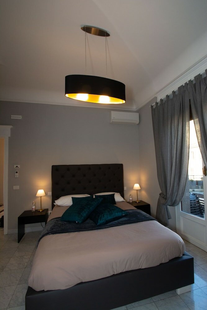 Фото Compasso Suites