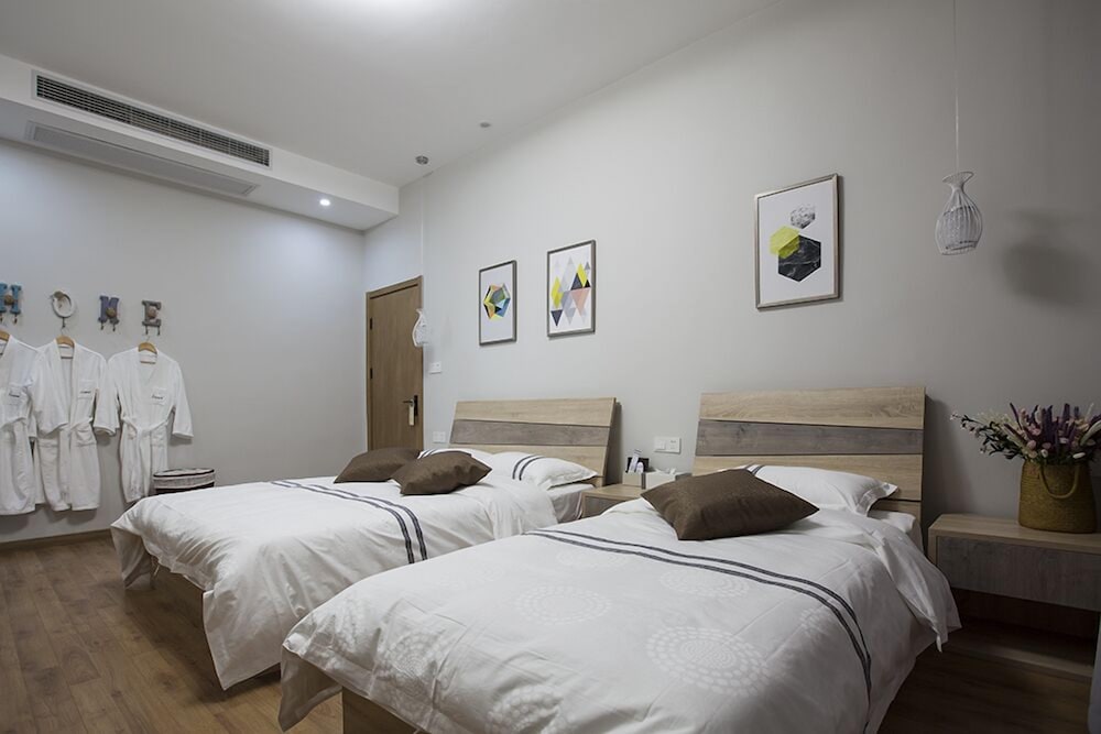 Фото Floral Hotel Nanjing Zuolingyoushe