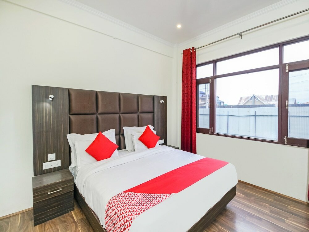 Фото Capital O 29999 Hotel Green Ambition
