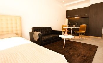 Фото Checkin Apartments