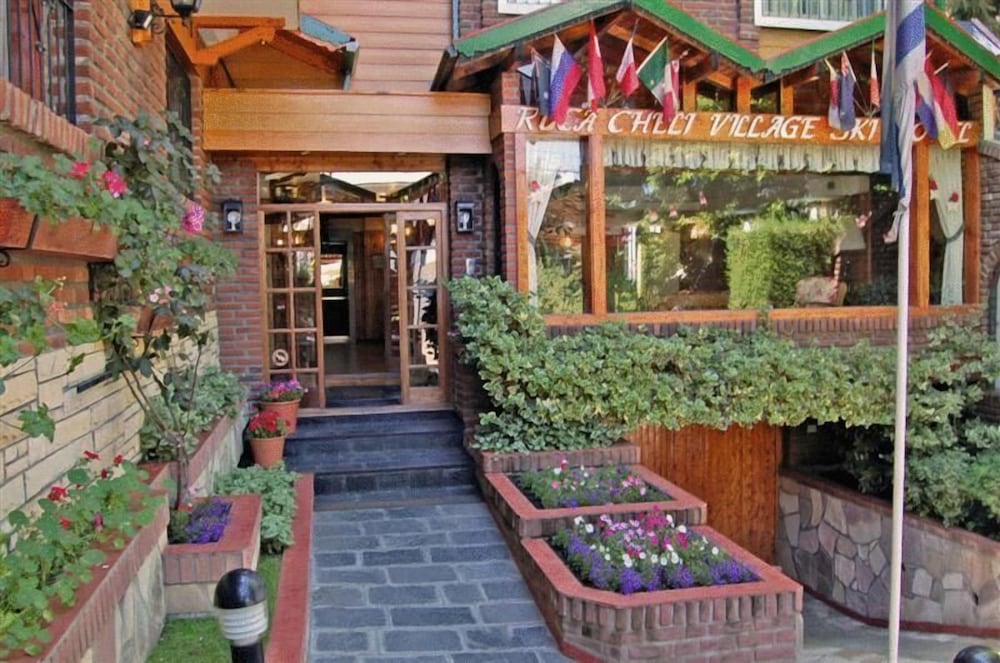 Фото Ruca Cheli Village Ski Hotel