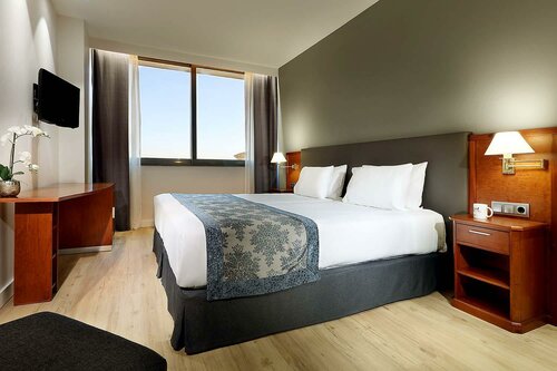 Гостиница Hotel Exe Isla Cartuja в Севилье