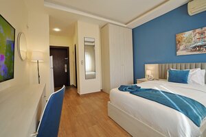 Гостиница 46 Serviced Apartments