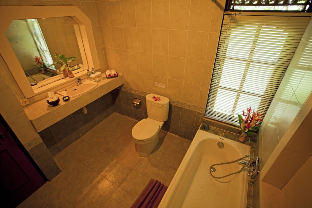 Фото Artini Cottages 1