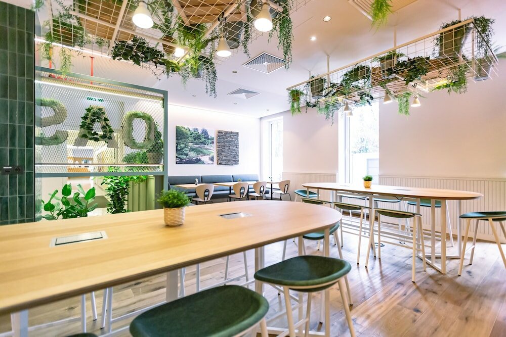 Фото Stadtoase Kolping Hotel