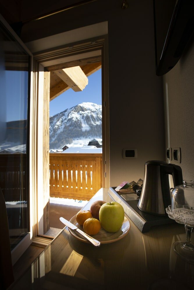 Фото Hotel Garni La Suisse