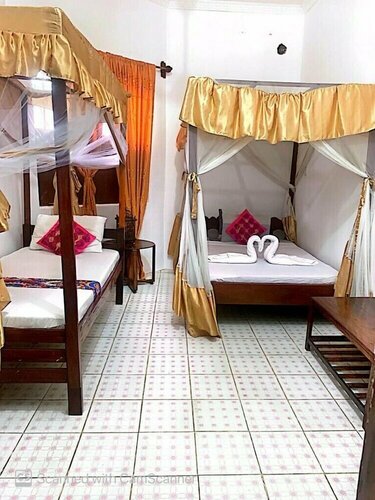 Гостиница 9 Dollar Hotel Zanzibar в Занзибаре