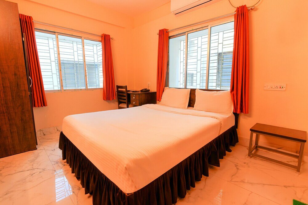 Фото Fabhotel Ashraya Inn