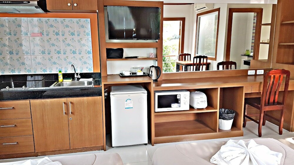 Фото Green Harbor Hotel & Service Apartment