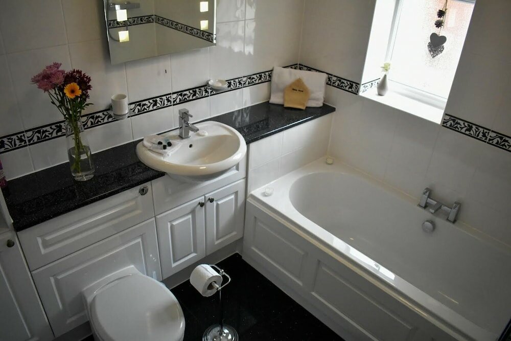 Фото Tlc Exmouth Bed and Breakfast