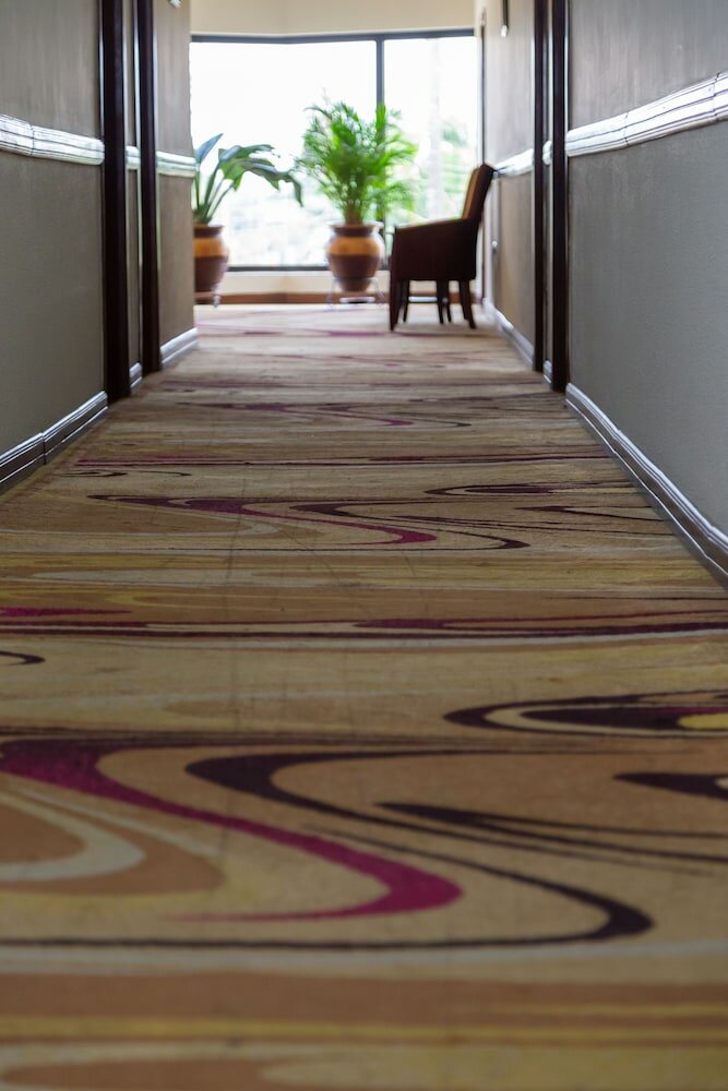 Фото Sunlodge Hotel