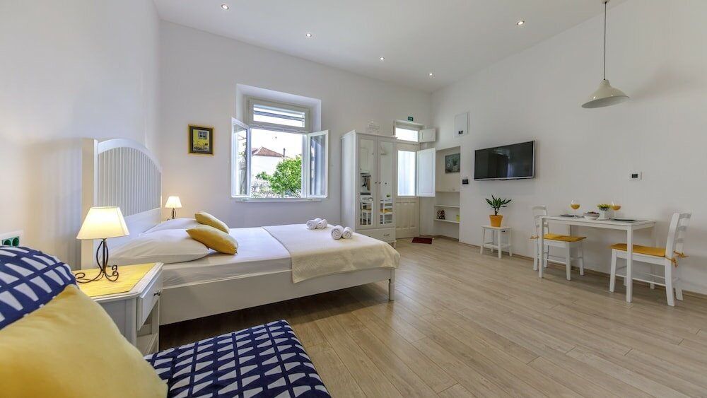 Фото Ivano's studio apartments