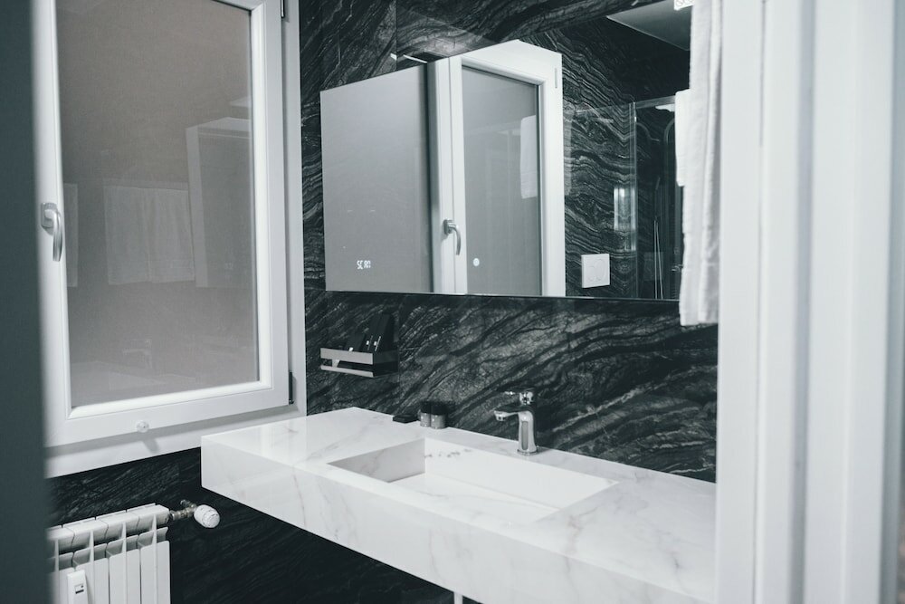 Фото Gregorio VII Luxury Suites