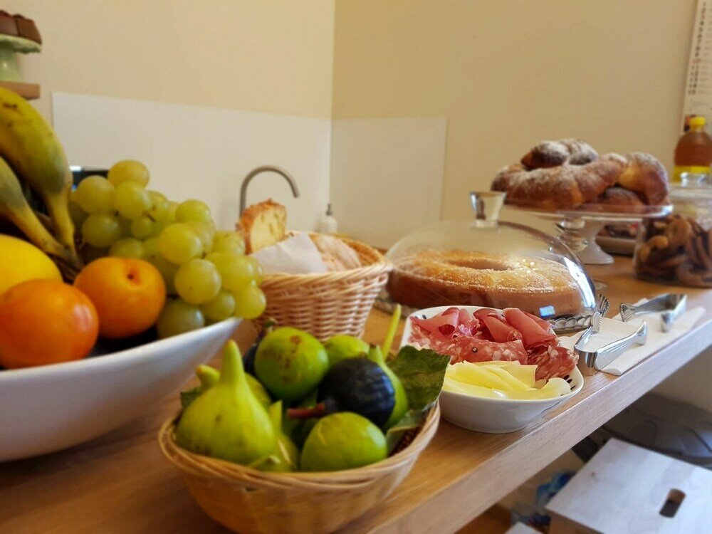 Фото A Casa 28 B&b