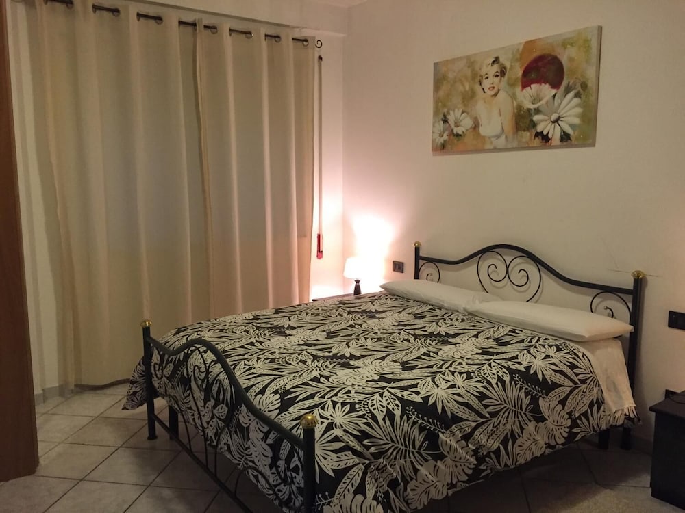 Фото M'ami Bed and Breakfast