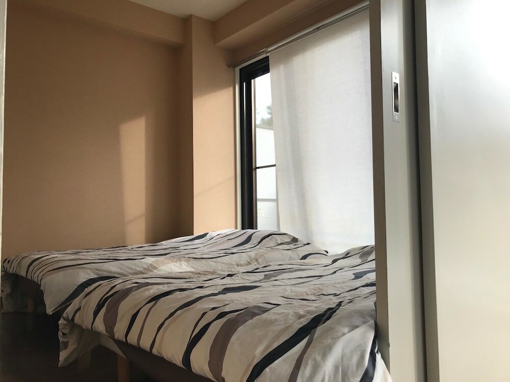 Фото Nipponbashi Dotonbori Apartment