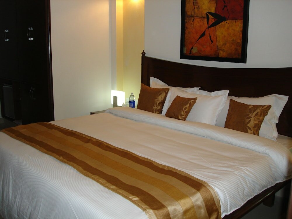 Фото Mint Ambience Suites