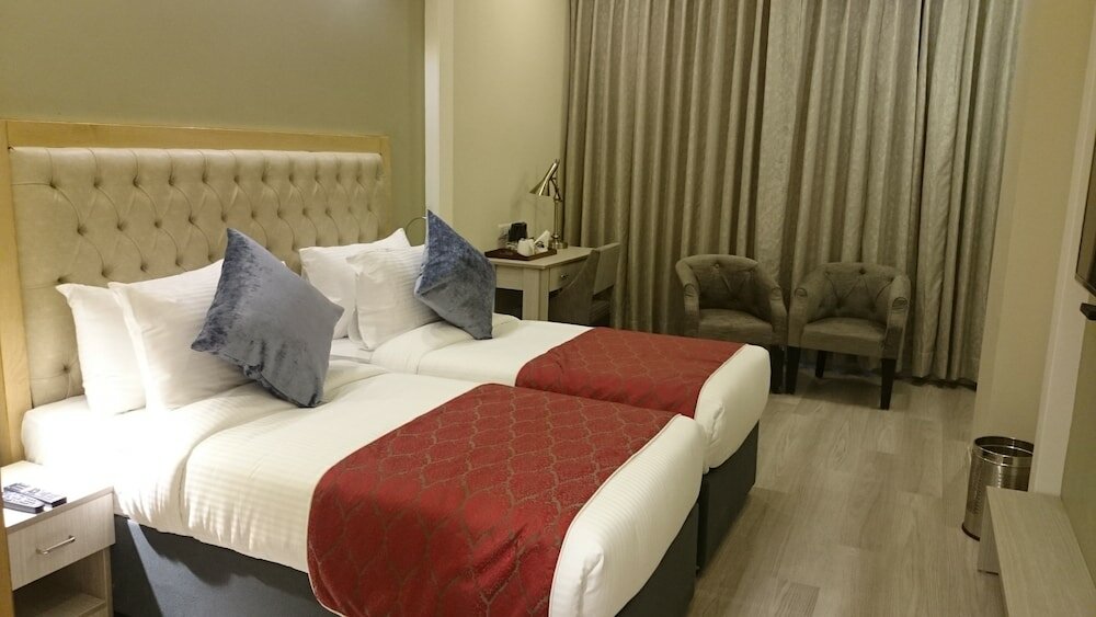 Фото Mango Hotels Naveen