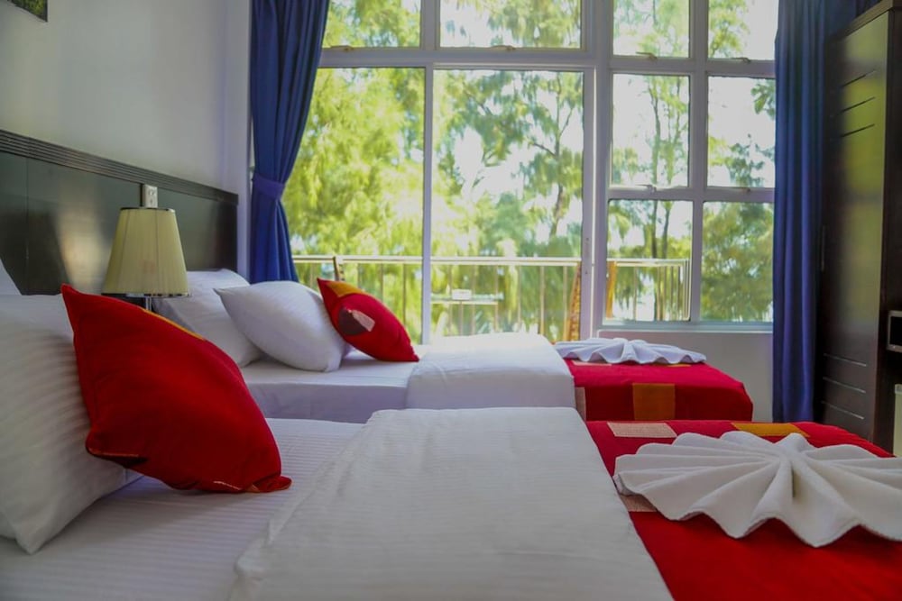 Фото Sunny Suites Inn