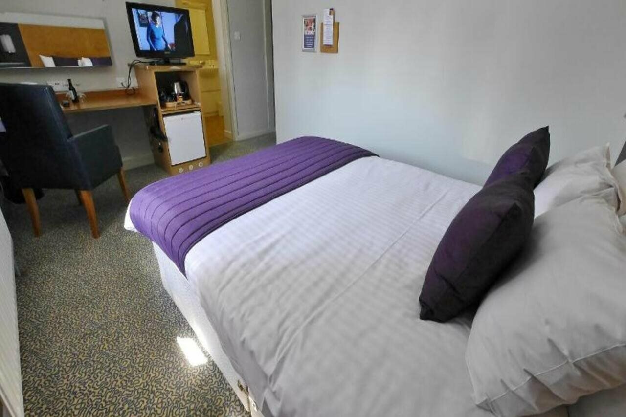 Фото Corner House Hotel