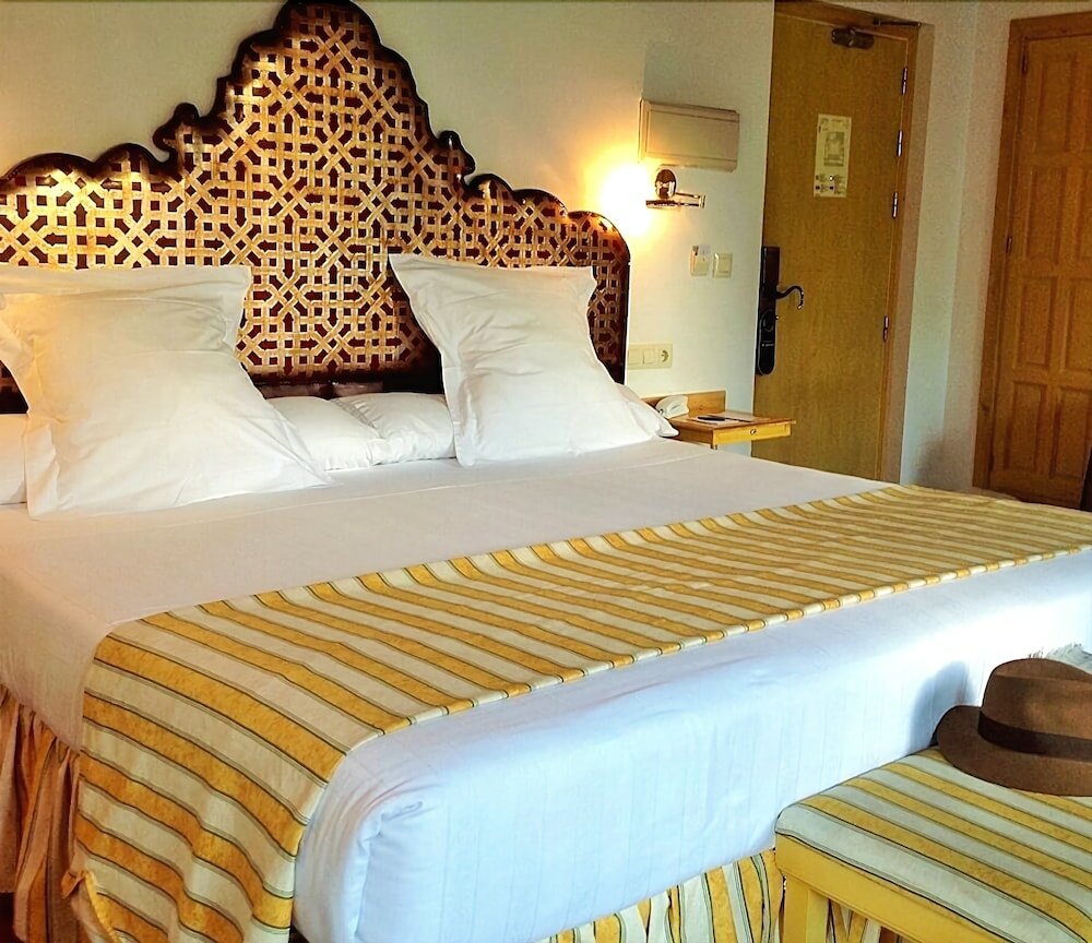 Фото Las Casas de la Juderia Hotel